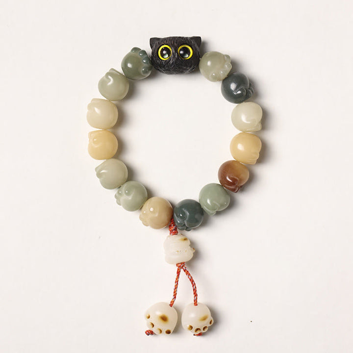 Buddha Stones Semi di Bodhi naturali Zampa adorabile Braccialetto di saggezza del gatto fortunato in legno di ebano - Semi di Bodhi multicolore - Versione con nappa (circonferenza del polso 14-15 cm) - image 7