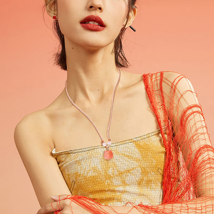 Collana con ciondolo di protezione leone danzante in agata rossa e ossidiana lucida in argento naturale Buddha Stones