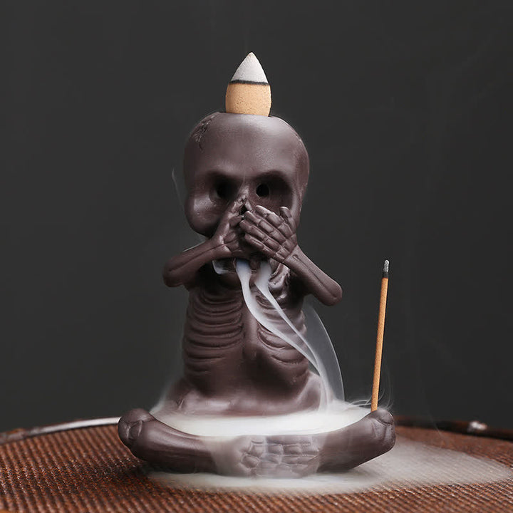 Buddha Stones Piccolo teschio Fantasma Argilla viola Fontana di fumo a riflusso Bruciatore di incenso della pace Decorazione
