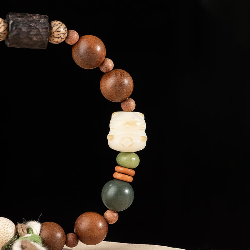 Buddha Stones Fulmine Legno Bodhi Seme Zampa di Gatto Artiglio Auspicio Protezione Nappa Braccialetto - image 4