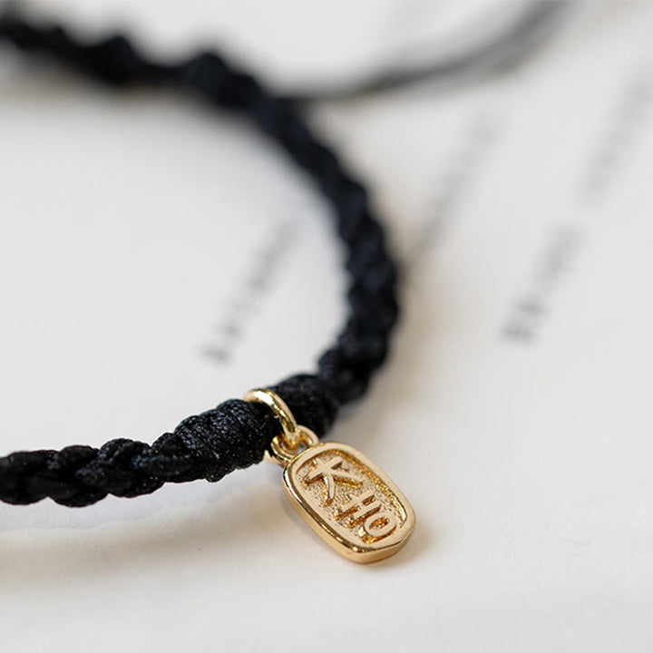 Braccialetto con corda positiva con fibbia rotonda in calcedonio Buddha Stones