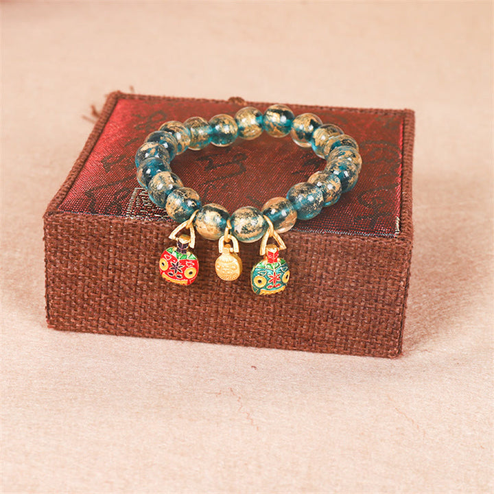 Buddha Stones Tibetan Gold Deglutizione Bestia Famiglia Dorje Vajra Forza Braccialetto di Perline