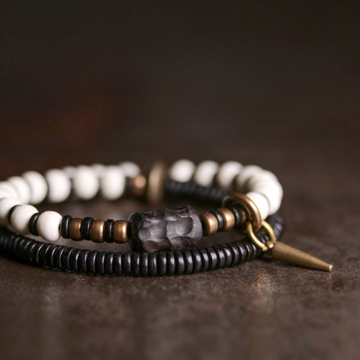 Braccialetto di coppia con perline di osso, ebano, Buddha Stones e rame