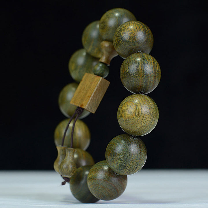 Braccialetto di cura in legno di sandalo verde tibetano Buddha Stones - image 4
