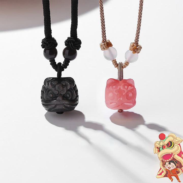 Collana con ciondolo di protezione leone danzante in agata rossa e ossidiana lucida in argento naturale Buddha Stones