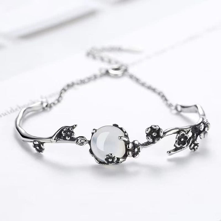 Braccialetto positivo Buddha Stones Plum Blossom Chalcedony