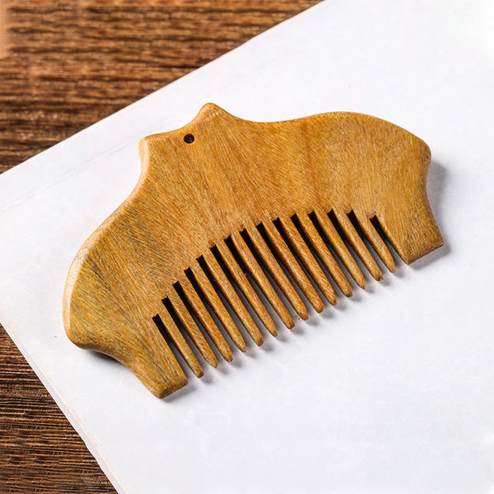 Pettine lenitivo inciso con motivo floreale in legno di sandalo verde Buddha Stones