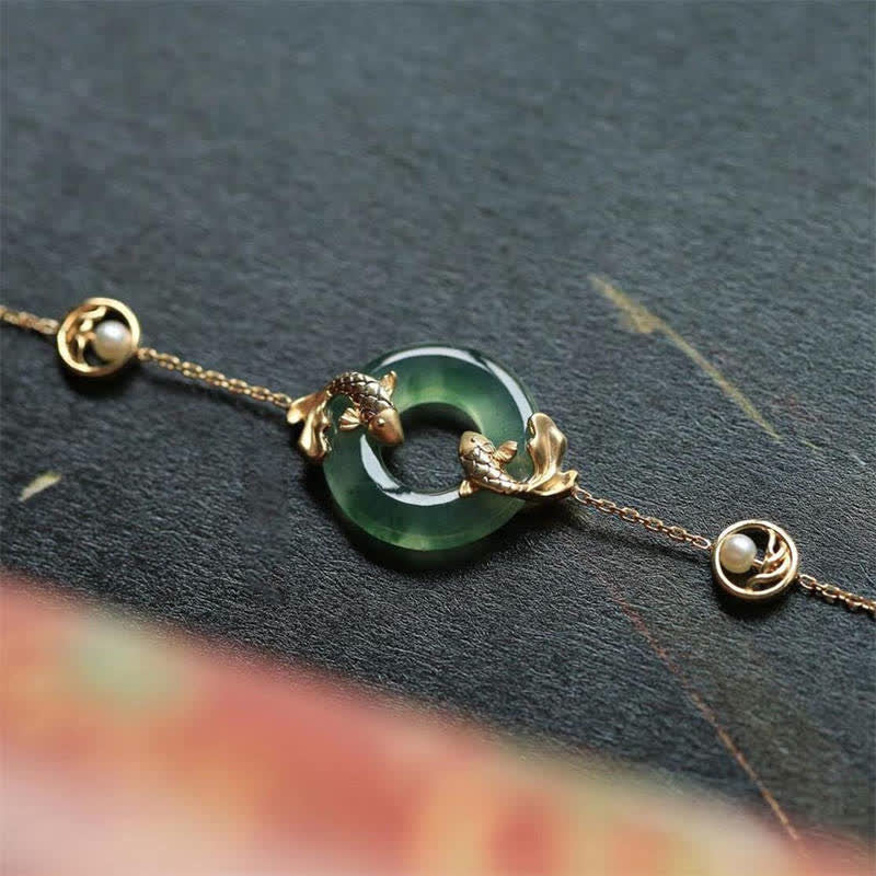 Braccialetto di armonia curativa con pesce koi in giada ciano Buddha Stones