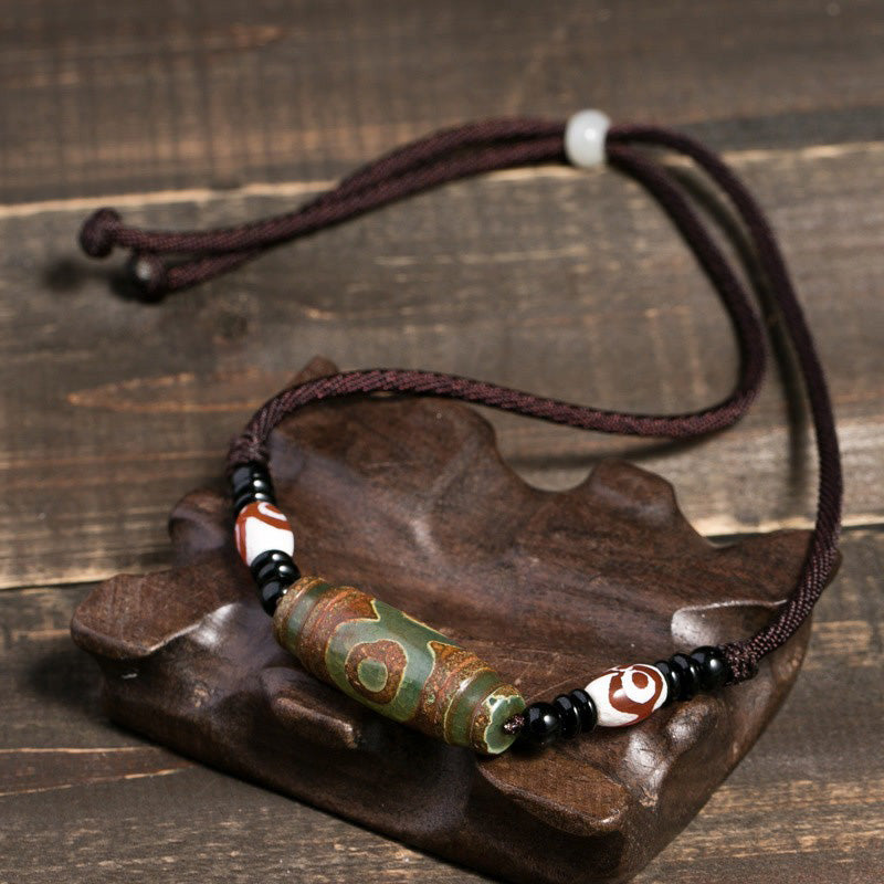 Buddha Stones Collana di perline tibetane Dzi a nove occhi con cordino protettivo - image 5