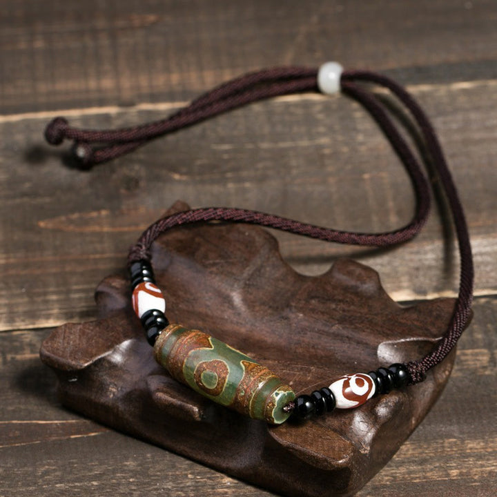 Buddha Stones Collana di perline tibetane Dzi a nove occhi con cordino protettivo - image 5