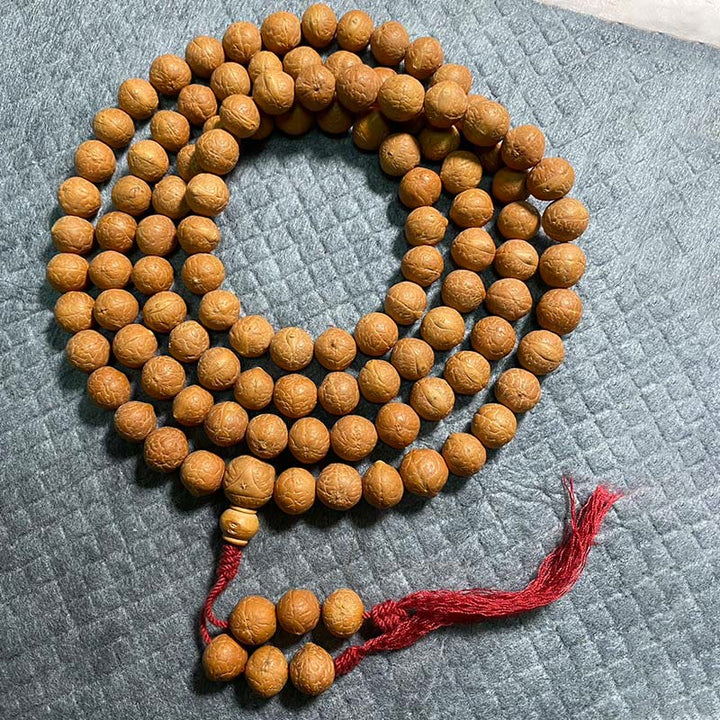 Buddha Stones 108 Mala Beads Nepal Bodhi Seed Fortuna Ricchezza Braccialetto con Nappa - 13 millimetri - image 0