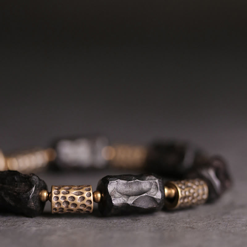 Braccialetto Buddha Stones Tibetano Ebano Legno Rame Calma Pace