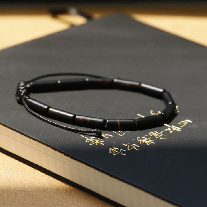 Braccialetto di protezione e supporto con perline di onice nero Buddha Stones