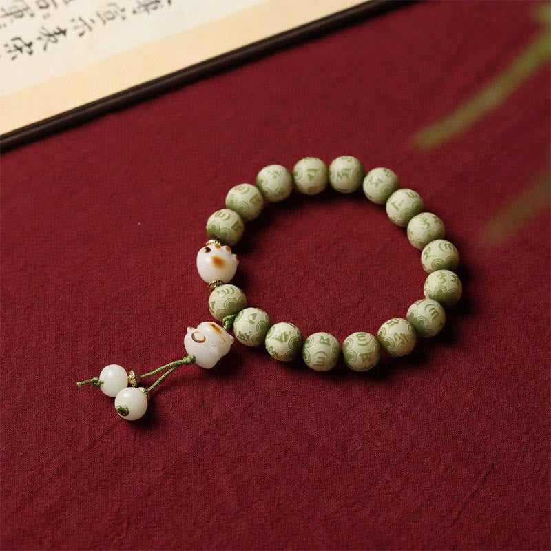 Buddha Stones Semi di Bodhi verdi Zampa di gatto Om Mani Padme Hum Braccialetto della saggezza inciso - Seme di Bodhi (Buon auspicio♥Fortuna) - image 1