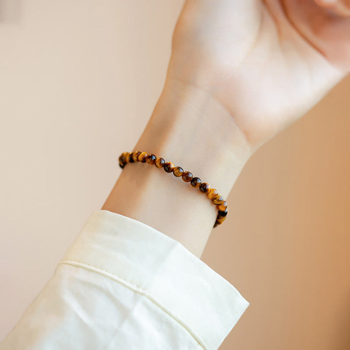 Braccialetto di protezione del coraggio in pietra naturale occhio di tigre placcato oro 14K Buddha Stones
