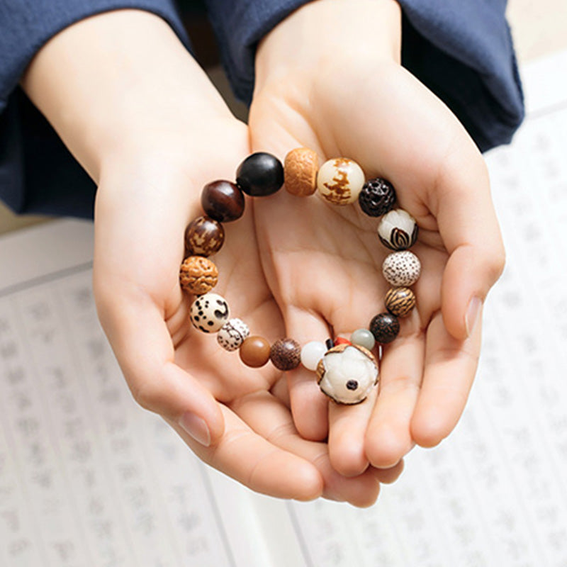 Bracciale Mala da polso Buddha Stones, semi di Bodhi, loto, saggezza, pace