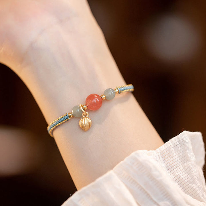 Braccialetto Buddha Stones Red Agate Jade Lotus Confidence Calm String