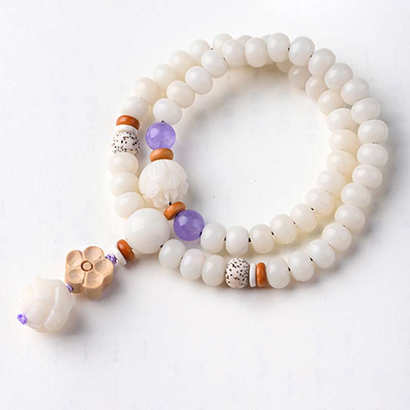 Braccialetto di benedizione del loto Bodhi in giada bianca tibetana Buddha Stones