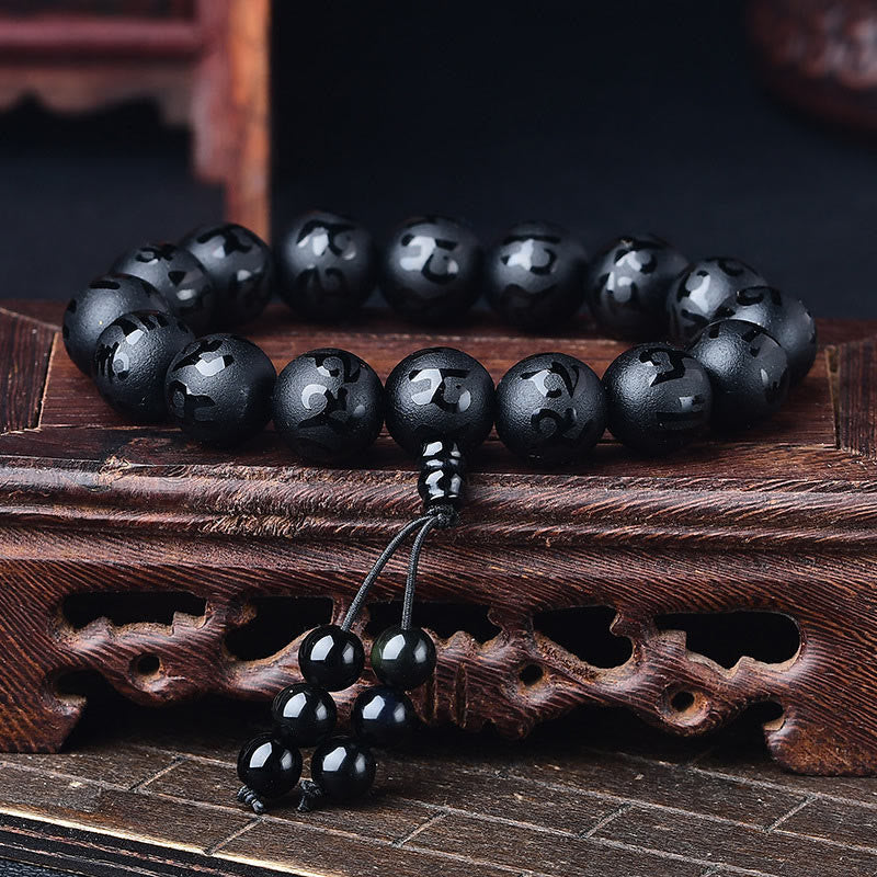 Braccialetto di meditazione Om Mani Padme Hum in onice nero e cristallo bianco del Tibet Buddha Stones