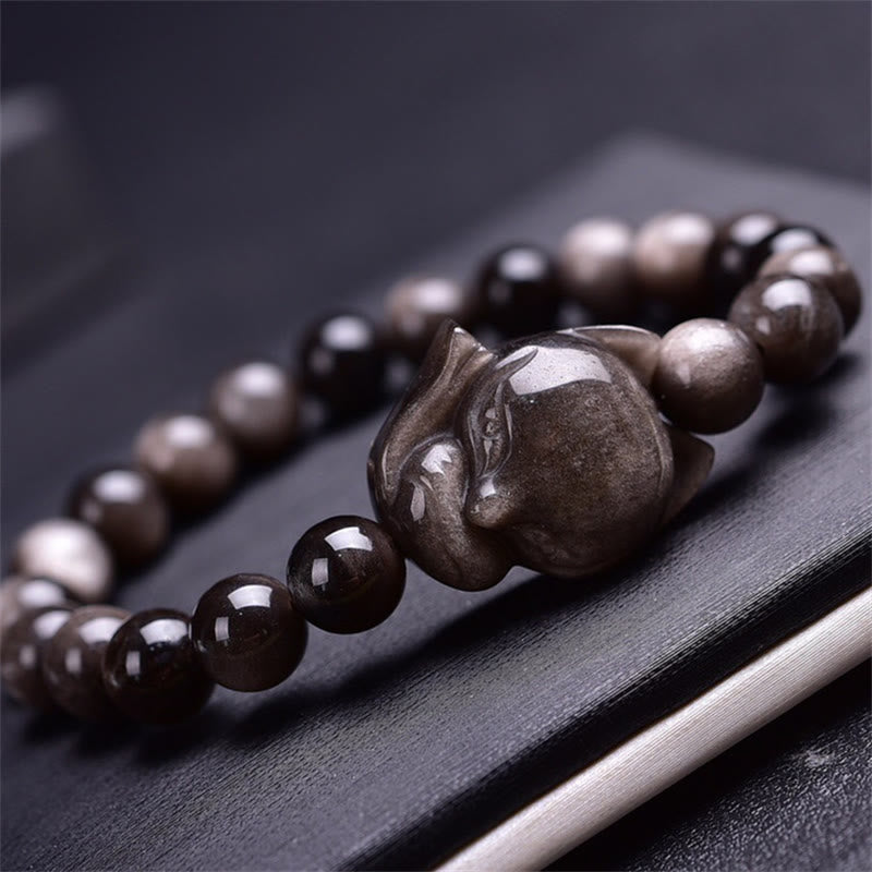 Braccialetto di protezione in ossidiana naturale con Buddha Stones argento lucido