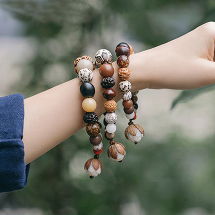 Bracciale Mala da polso Buddha Stones, semi di Bodhi, loto, saggezza, pace