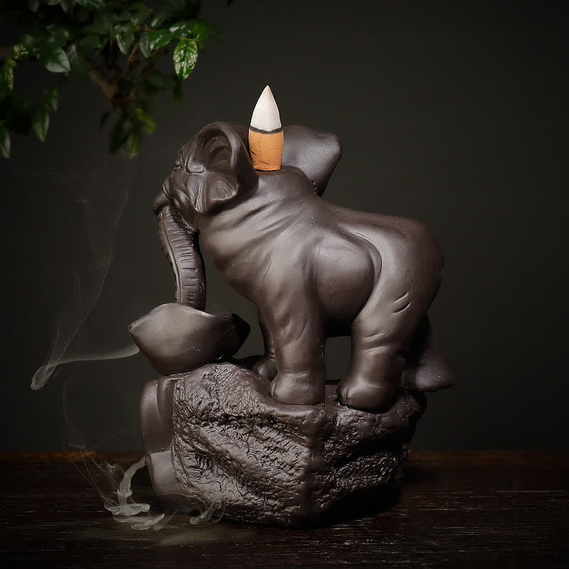 Decorazione bruciatore di incenso di guarigione della pace con fontana di fumo a riflusso in argilla viola elefante tibetano