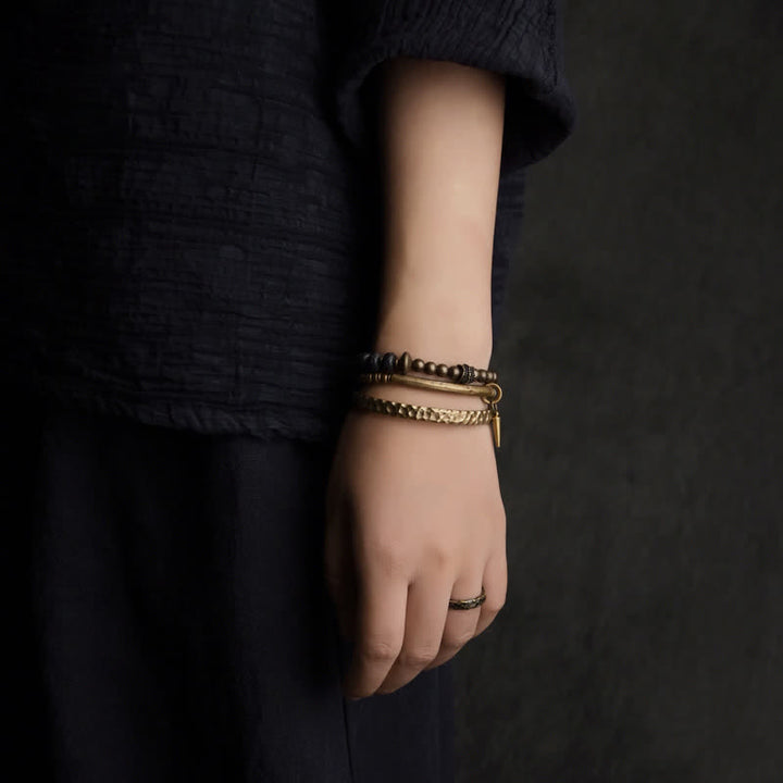 Bracciale rigido con polsino in pietra lavica e rame Balance