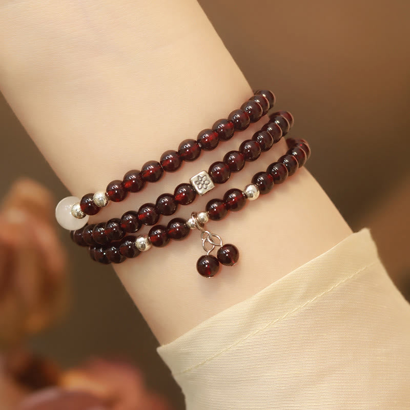 Braccialetto triplo giro Buddha Stones in argento sterling 925 con granato naturale e protezione per gli occhi di gatto - 18 centimetri - image 1