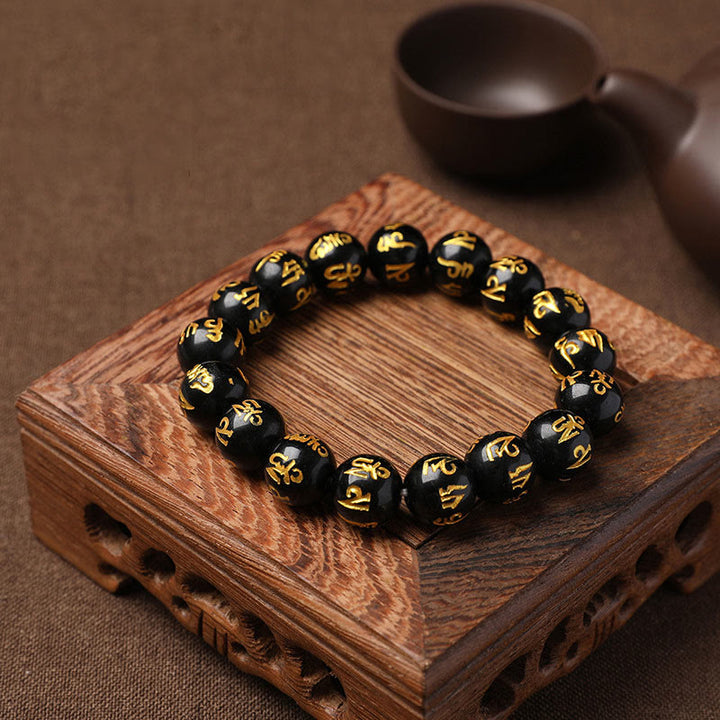 Braccialetto di meditazione Om Mani Padme Hum in onice nero e cristallo bianco del Tibet Buddha Stones