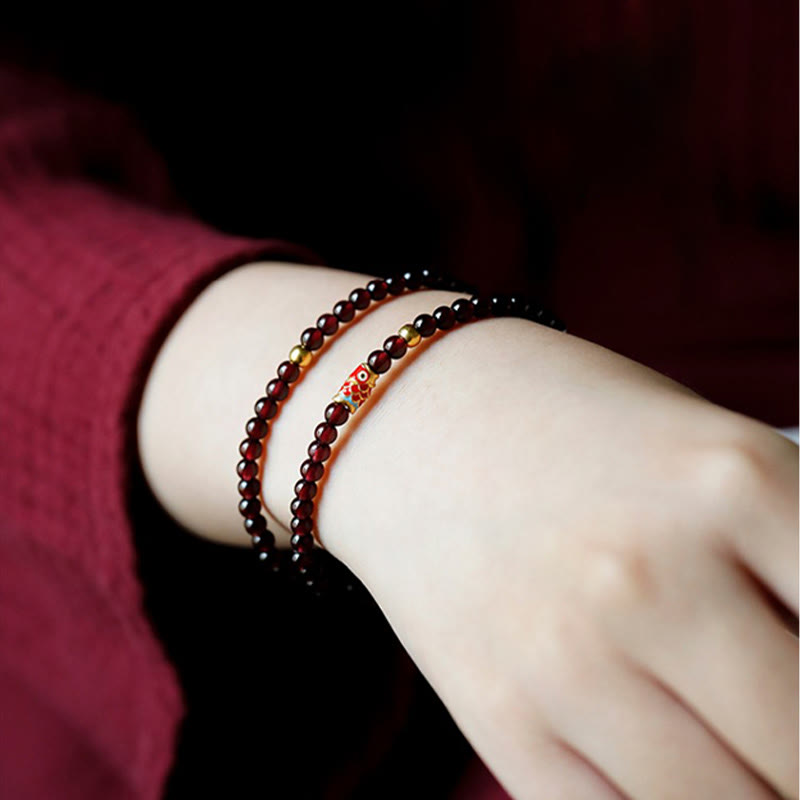 Braccialetto di protezione in granato naturale con pesce koi in oro 999 Buddha Stones - image 13