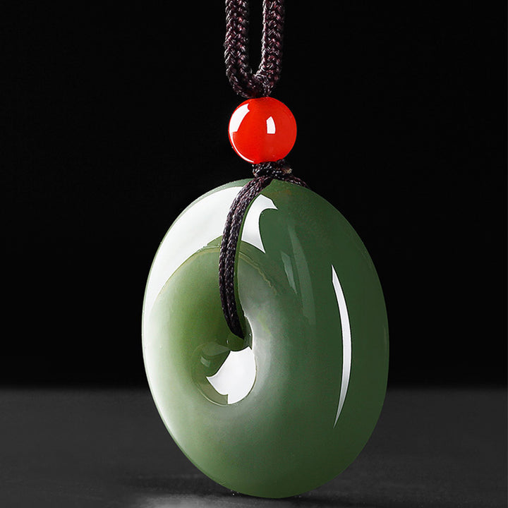 Collana con ciondolo a corda con fibbia della pace in giada rotonda naturale Buddha Stones
