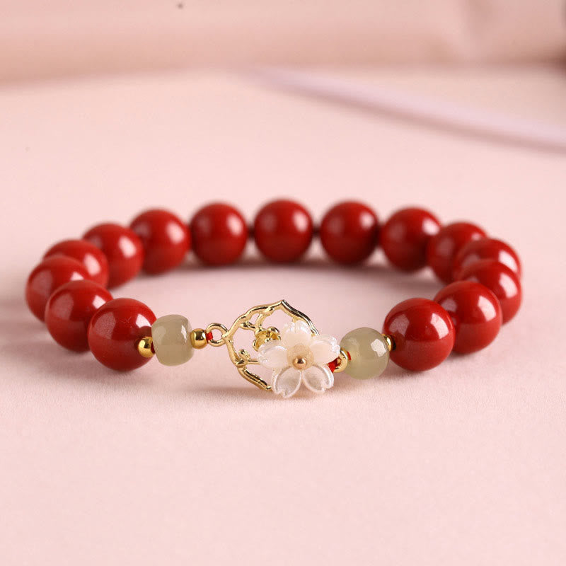 Braccialetto di benedizione con fiore di pietra di tridacna con perline di giada naturale di cinabro Buddha Stones