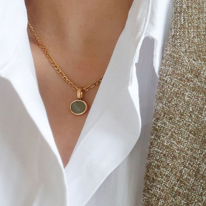 Collana con ciondolo in acciaio al titanio con resistenza turchese ovale