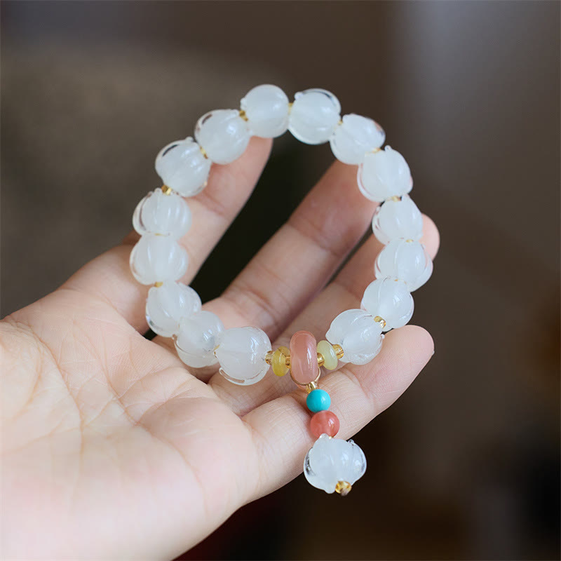 Braccialetto dell'illuminazione con ciondolo leone danzante avorio, perline di vetro Liuli, motivo loto, fluorite e Buddha Stones
