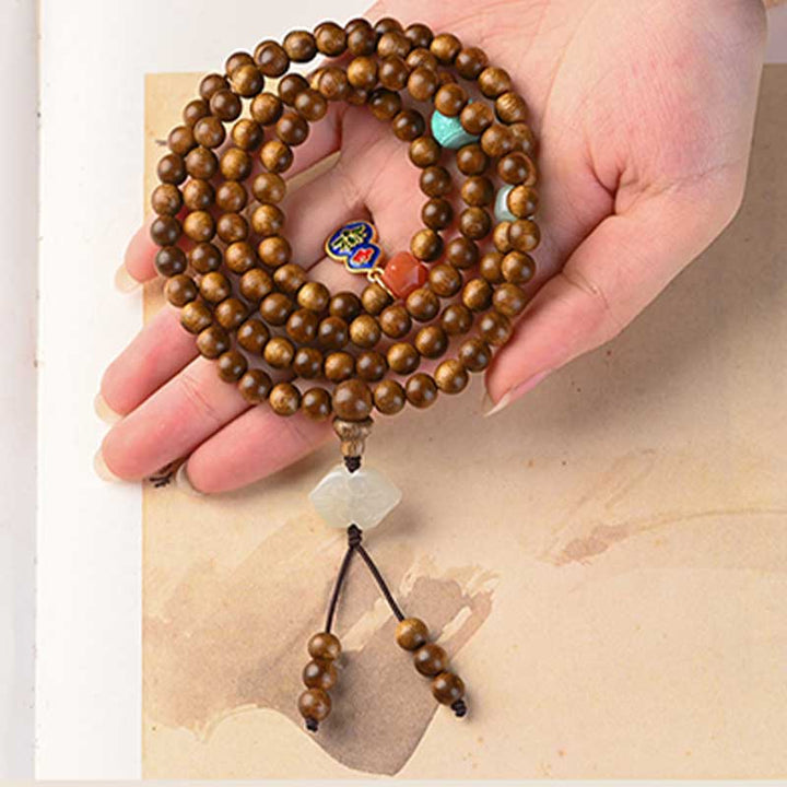 Braccialetto di protezione e calma in palissandro tibetano Buddha Stones Mala