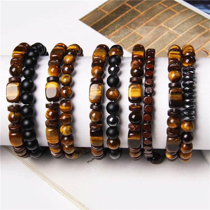 Braccialetto del coraggio in pietra ematite con occhio di tigre e pietre smerigliate Buddha Stones