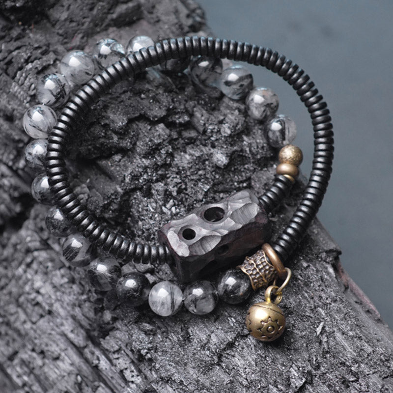 Braccialetto di coppia della saggezza del rame del legno di ebano del quarzo rutilato nero Buddha Stones