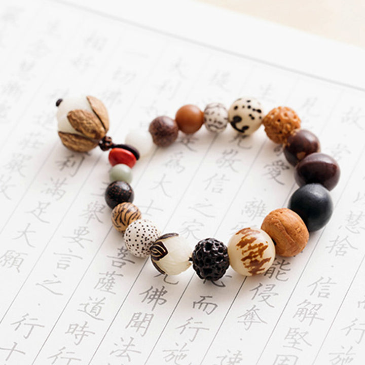 Bracciale Mala da polso Buddha Stones, semi di Bodhi, loto, saggezza, pace