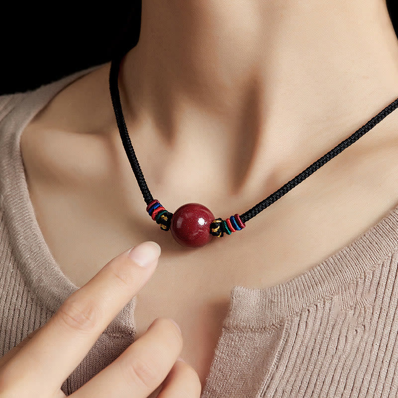 Collana con ciondolo in corda di benedizione con perline di cinabro e Buddha Stones