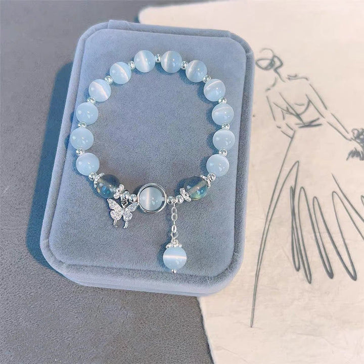 Braccialetto di supporto con ciondolo a forma di stella a forma di farfalla, pietra di luna e occhio di gatto Buddha Stones - image 6