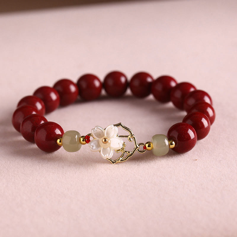 Braccialetto di benedizione con fiore di pietra di tridacna con perline di giada naturale di cinabro Buddha Stones
