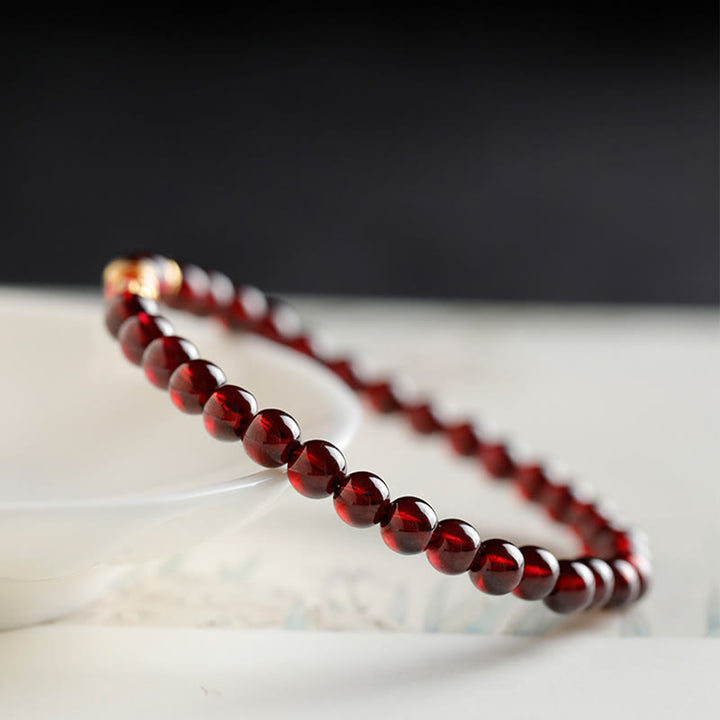 Braccialetto di protezione in granato naturale con pesce koi in oro 999 Buddha Stones - image 3