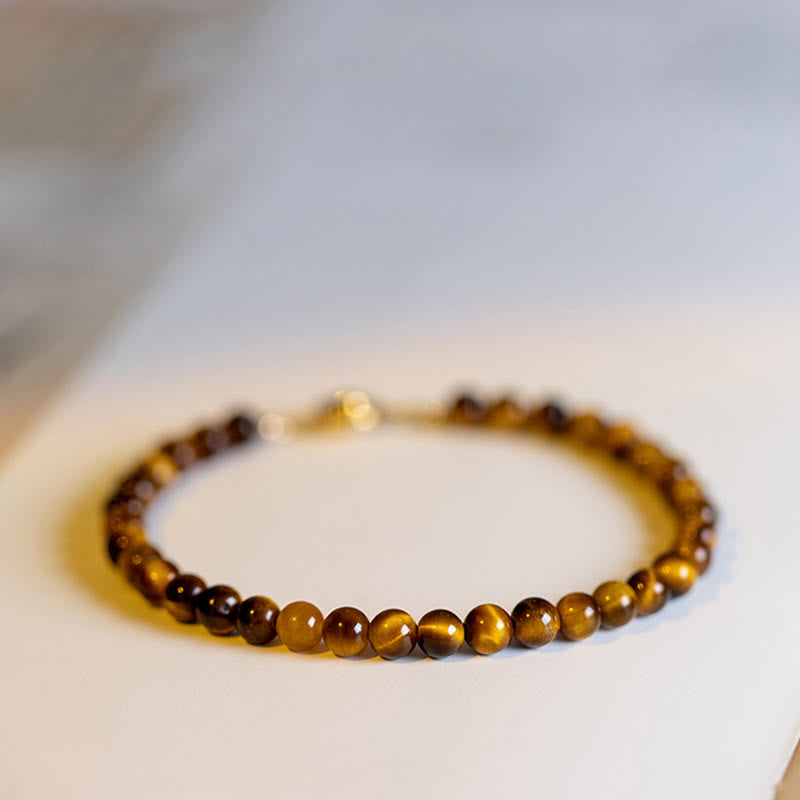 Braccialetto di protezione del coraggio in pietra naturale occhio di tigre placcato oro 14K Buddha Stones