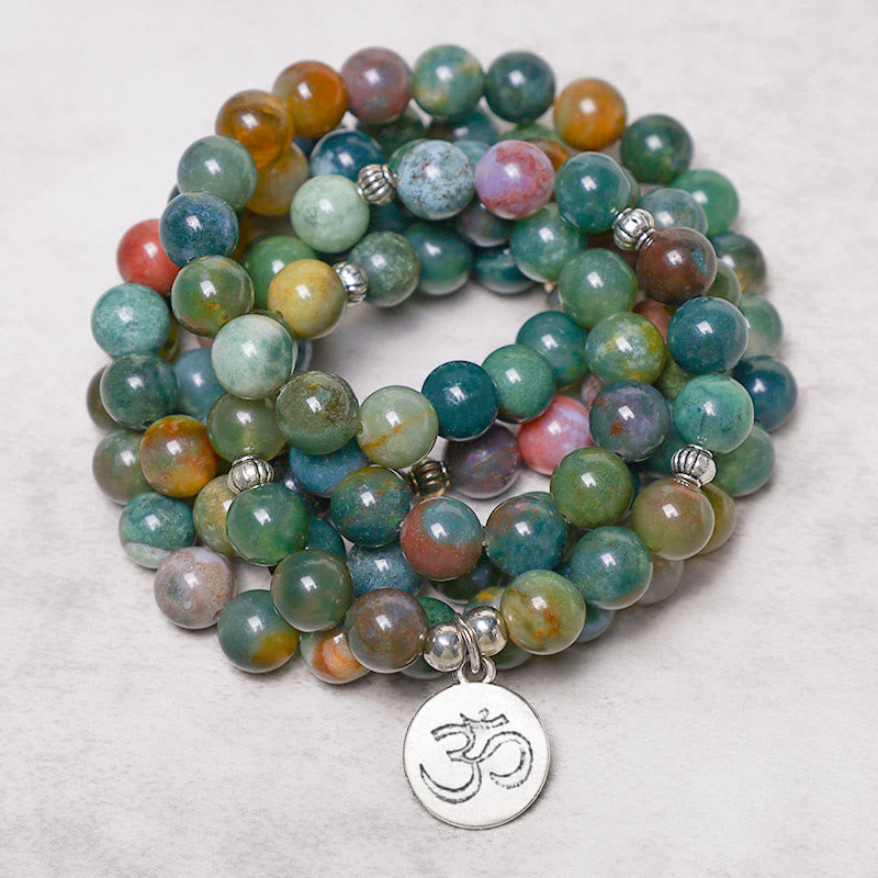 Braccialetto Buddha Stones con 108 perle di agata indiana, loto, OM e albero della vita, simbolo di calma e positività. - image 2