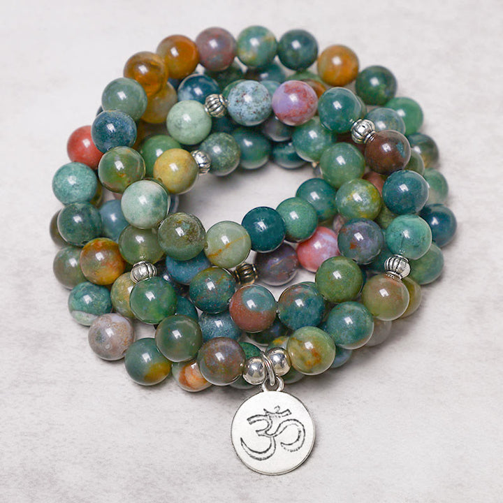 Braccialetto Buddha Stones con 108 perle di agata indiana, loto, OM e albero della vita, simbolo di calma e positività. - image 2