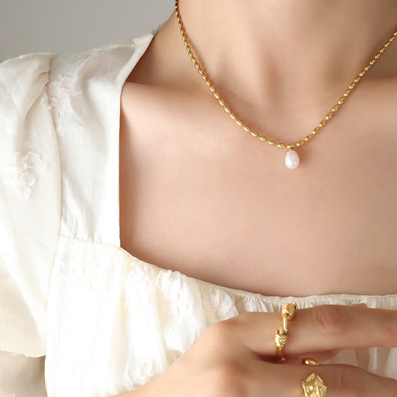 Collana con ciondolo di perle e perle della pace