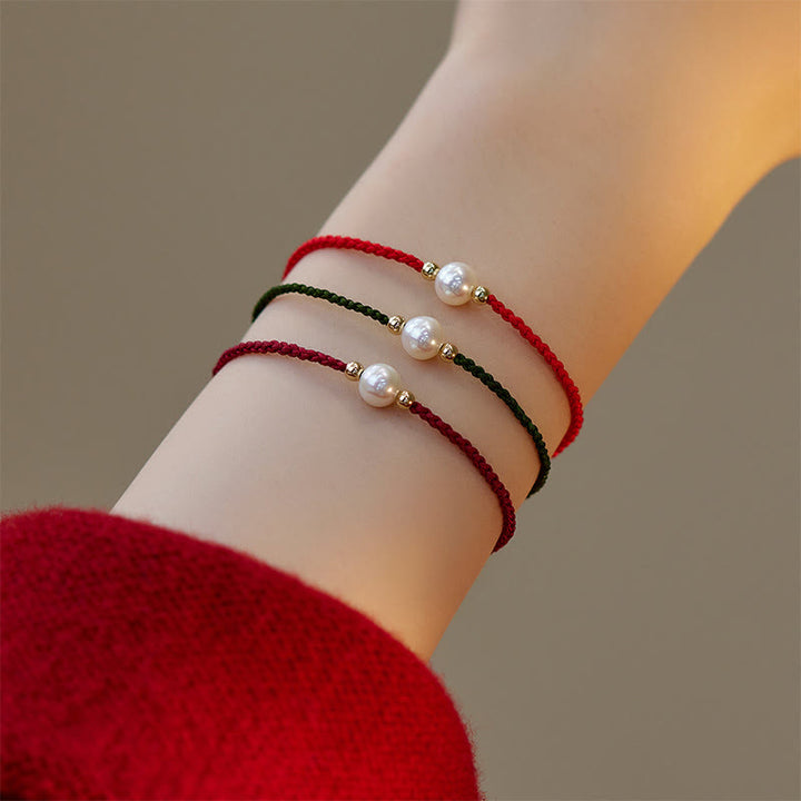 Braccialetto con treccia di perle naturali Buddha Stones Luck String