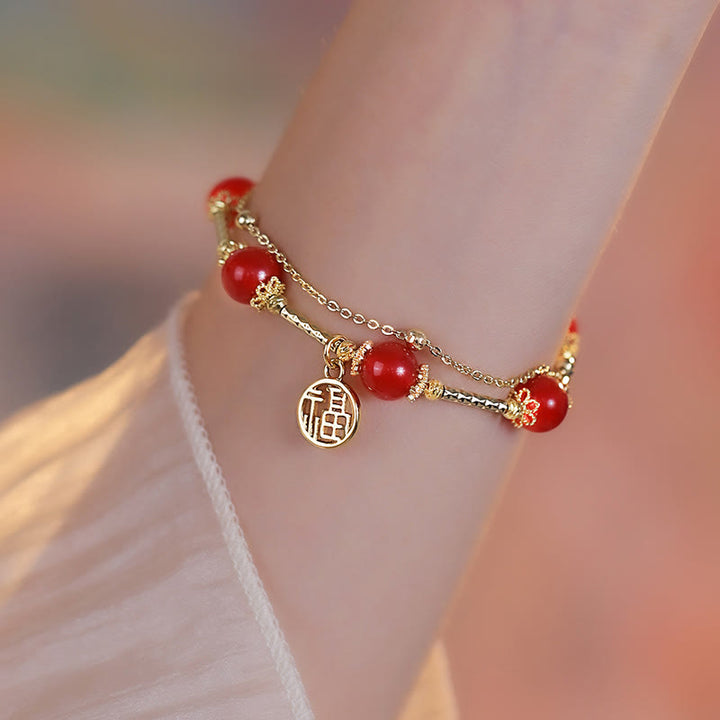 Braccialetto di accettazione di sé con ciondolo a forma di carattere Fu in agata rossa Buddha Stones