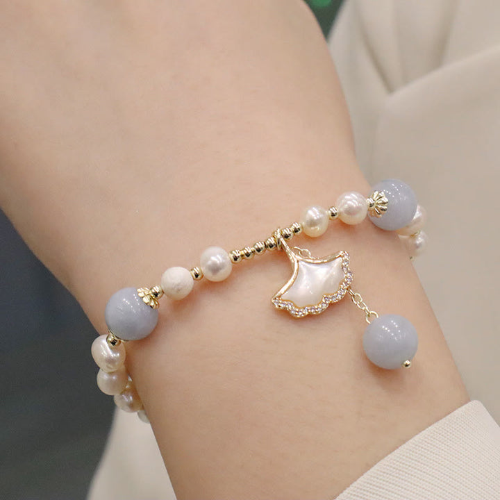 Braccialetto con ciondolo a forma di farfalla con foglia di ginkgo e perle di acquamarina naturale Buddha Stones