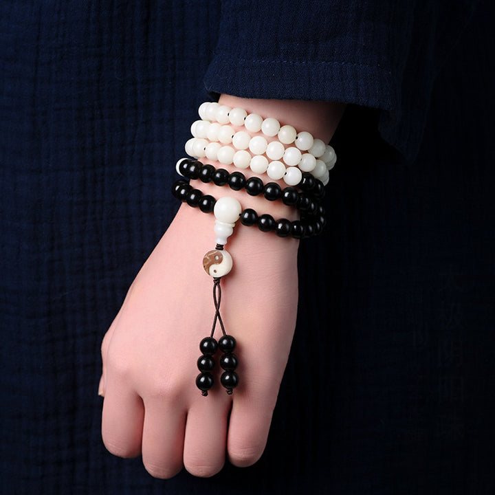 Collana Mala con protezione YinYang in ebano e Buddha Stones